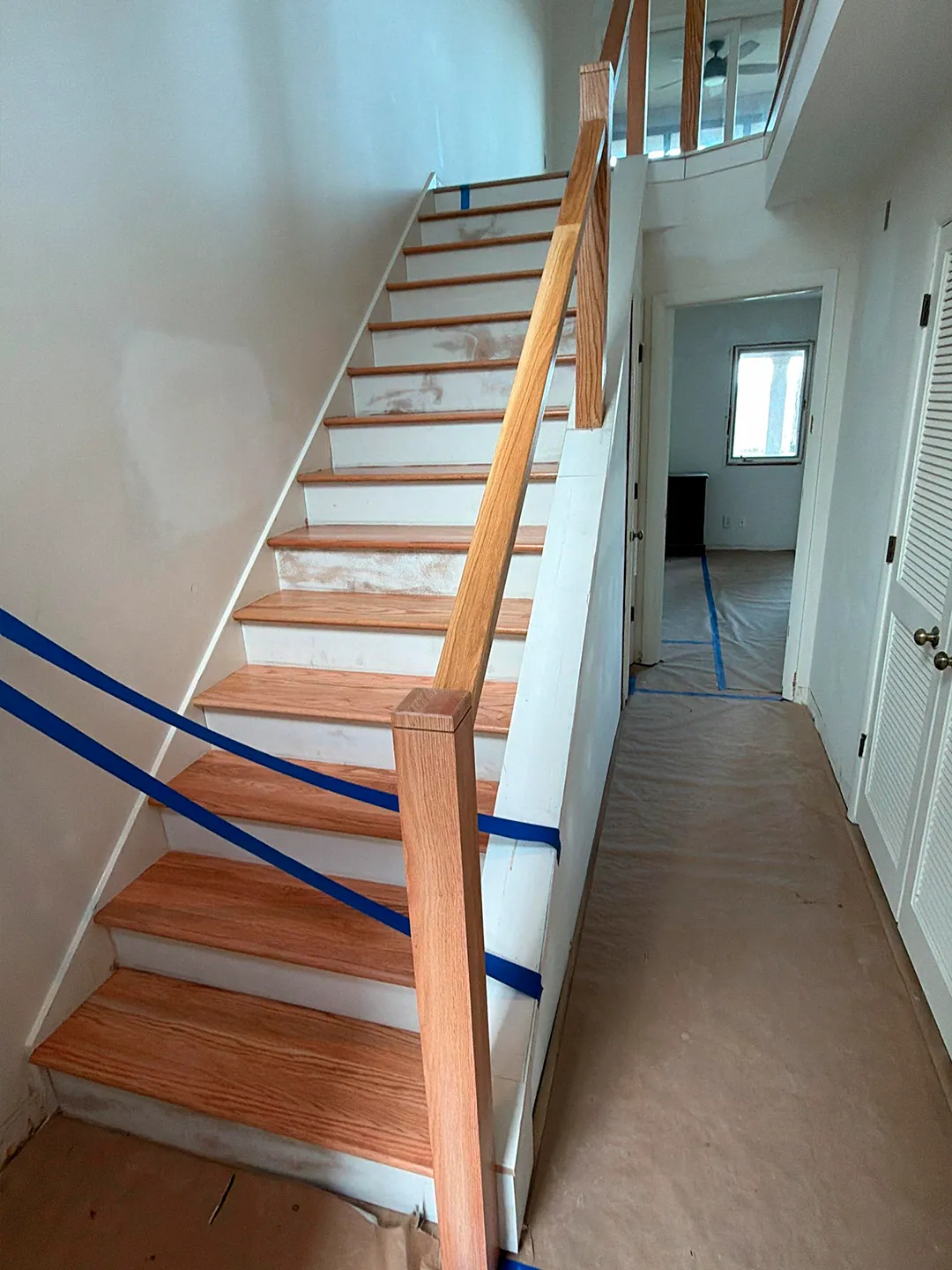 Staircase and handrail renovation in progress by HL Remodeling