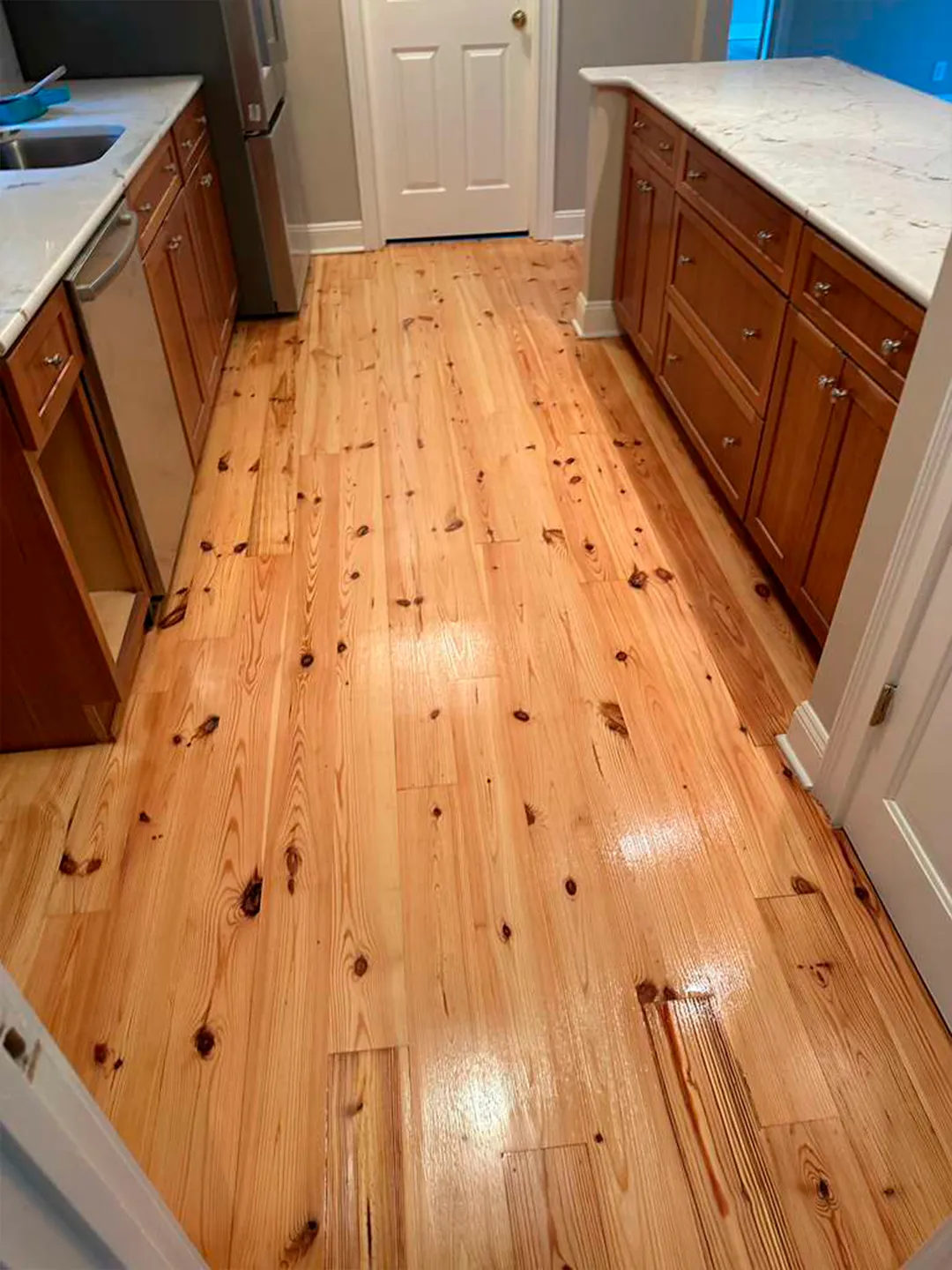 Hardwood floor sanded and refinished with a smooth satin protective finish