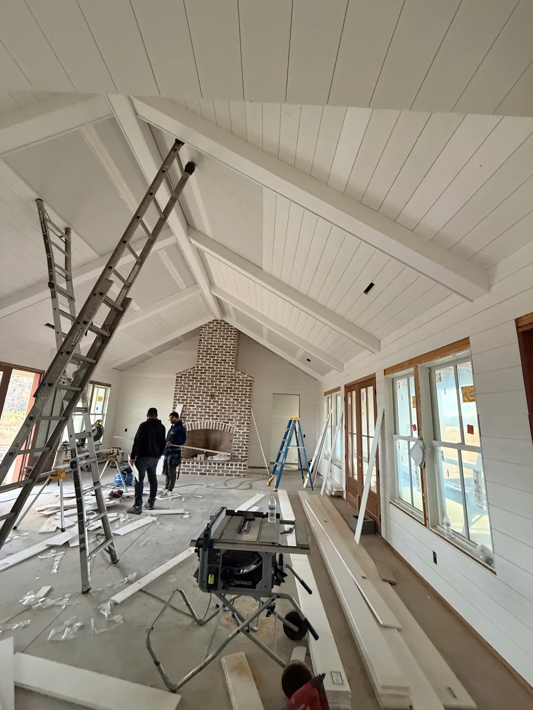 Shiplap ceiling and architectural trim installation in progress